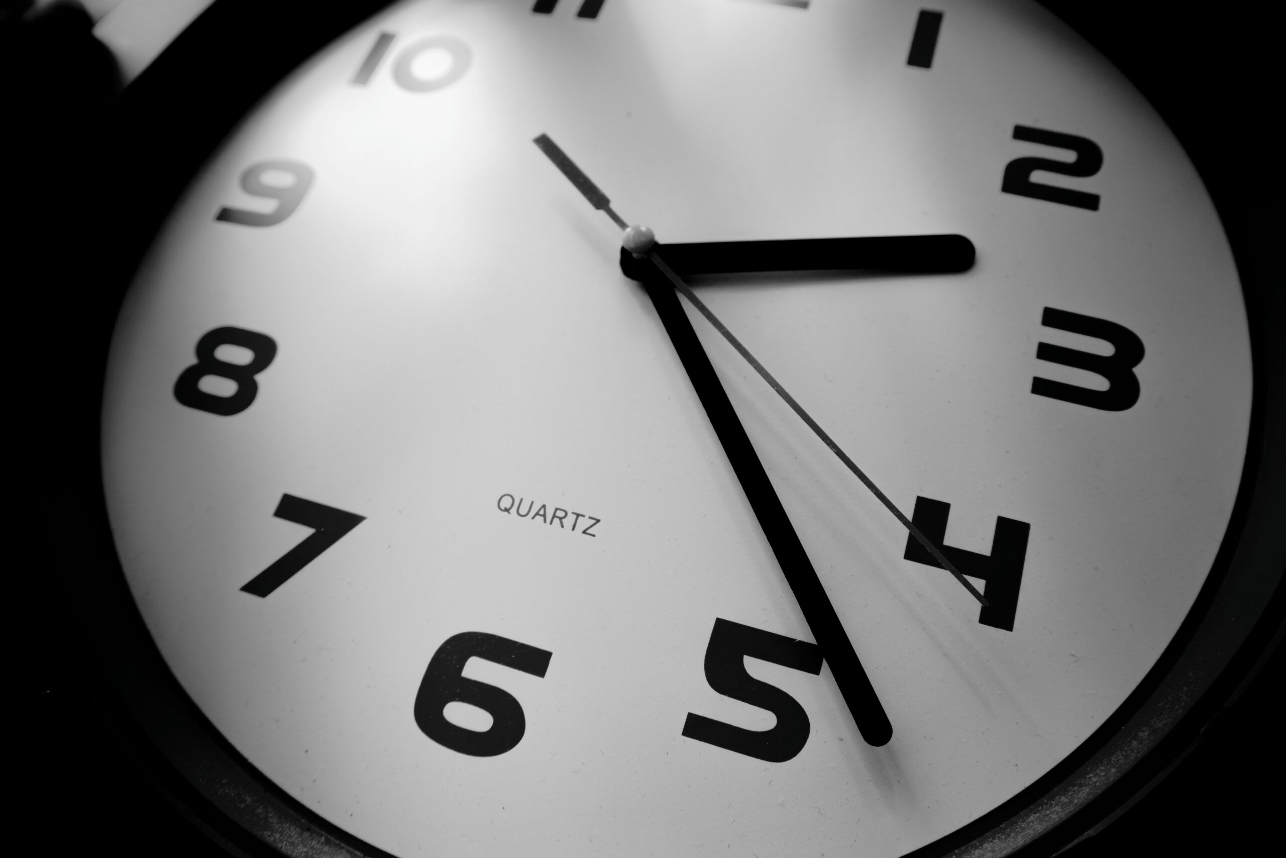 Close up photo of clock in black and white